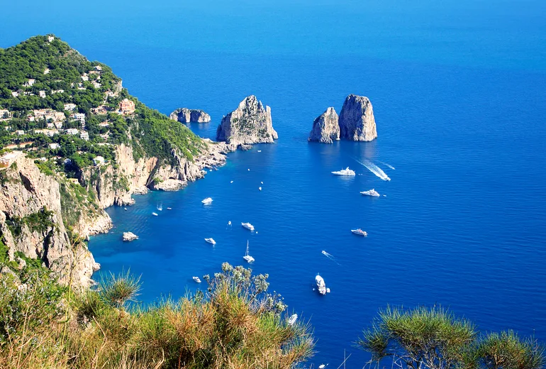 Capri Faraglioni sea stacks and boats seen from the Monte Solaro viewpoint