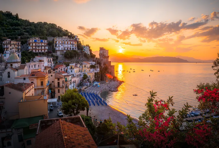 Sunset over Cetara village and its medieval tower on the Amalfi Coast